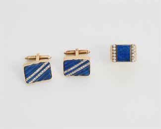 2107
A Group Of Lapis Lazuli And Diamond Jewelry
14k & 18k yellow gold
Comprising a pair of 14k yellow gold swivel-back cufflinks and an 18k yellow gold ring
32 grams gross
3 pieces
Estimate: $800 - $1,200