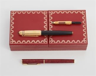 2108
Two Fountain Pens Including Cartier And Waterford
Including an 18k gold and black enameled Cartier fountain pen, stamped: 18K / Pasha de Cartier / 1990 / 5171 with box, certificate of authenticity, and additional insert piece; and a gold-toned metal and red enameled Waterford pen
3 pieces
Estimate: $300 - $500