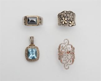 2109
A Group Of Jewelry
Sterling silver and 14k gold
Comprising a topaz and diamond pendant set in sterling silver and 14k yellow gold, stamped: T & C; a hematite ring set with sterling silver and 14k yellow gold; and two sterling rings set with simulated diamonds
Pendant: 1.25" L x .65" W
43.8 grams
4 pieces
Estimate: $400 - $600