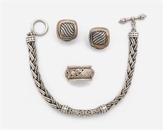 2114
A Group Of Jewelry, Including David Yurman
Comprising a pair of 18k yellow gold and sterling silver ear clips, stamped: DY [David Yurman]; an 18k yellow gold and sterling ring; and a sterling silver bracelet
Earrings: .65" H; Ring size: 7.25; Bracelet 7.25"
57.3 grams gross
4 pieces
Estimate: $300 - $500