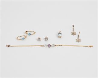 2143
A Group Of Gem-Set Jewelry
14k yellow and white gold
Comprising a simulated gemstone bracelet (7.25" L), a topaz and diamond pendant (.25"W x .625" H), a pair of stylized topaz and diamond earrings (.375" W x .875" H), a pair of aquamarine and diamond earrings set with twenty full-cut round diamond totaling approximately 0.40ct and graded H-I color and VS clarity (.25" W) and a pair of diamond-set snowflake earrings (.5" W)
14 grams
8 pieces
Estimate: $500 - $700