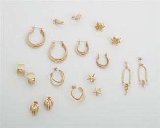 2148
A Group Of Gold Earrings
14k yellow gold
Comprising nine pair of gold earrings of various designs
Largest earrings: 1" W
23 grams
18 pieces
Estimate: $600 - $800
