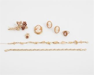 2150
A Group Of Gold Jewelry
14k yellow and rose gold
Comprising a gold link bracelet (8" L x .125" W), an animal themed gold bracelet (8" L x .5 W"), a shell cameo brooch (.875" W x 1.125" H ) with matching screw-back earrings (.5" W x .75" H), a flower brooch (1" W x 2" H) with a single matching earring (.5" W x .625" H), and a cameo ring (size: 5.5)
43 grams
8 pieces
Estimate: $800 - $1,200