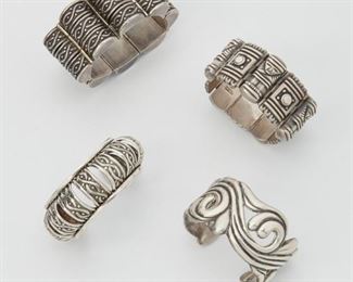 2187
A Group Of Mexican Silver Jewelry
Second-half 20th Century; Taxco, Mexico
Three stamped: Los Castillo / Taxco / Sterling / Made in Mexico; additional marks: 210, 491; One marked for unknown maker: CA / sterling
Comprising a Los Castillo a barrel-shaped bracelet with knot-motif; a Los Castillo cuff bracelet in same pattern; a foliate motif silver bracelet; and an abstract figural link bracelet, 4 pieces
Largest bracelet: 6.75" L x 1.25" H
257 grams gross
Estimate: $300 - $500