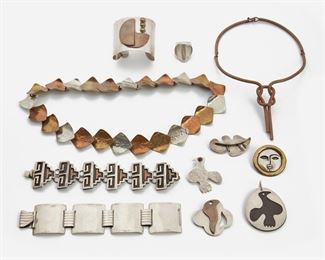 2191
A Group Of Modernist Silver Jewelry
Mid-20th Century
Comprising a mixed metal cuff, marked: Waldmann / Sterling; a four panel bracelet, marked: Silver/ Mexico; a copper wire Hercules knot necklace, marked: Taxco; a mixed metal face brooch, marked: 925; a brass, copper and silver necklace, unmarked; a Reveri link bracelet in copper and silver, marked: Hecho en Mexico / Sterling / 925 /RC; a Sam Kramer silver and copper brooch, marked: with artists cypher; two Ed Levin piece: one bird brooch, one unmarked reverse bird brooch with rosewood backing; an abstract leaf brooch maker unknown; a silver ring, maker unknown, 11 pieces
Hercules knot necklace: 15" L x 3.1" H; Largest link bracelet: 7.5" L x 1.5" W
460 grams gross
Estimate: $600 - $800