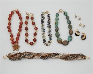 2193
A Group Of Jewelry
Metal
A carnelian bead necklace with flower clasp stamped, "Shianna -2005"; a turquoise bead necklace; a fresh-water pearl necklace; a carnelian and quartz bead necklace; a multi-strand necklace of tiger-eye, shell, plastic and apoxy; and three pairs of metal earrings
Carnelian Shianne necklace: 17" L x 1.60" H
11 pieces
Estimate: $400 - $600