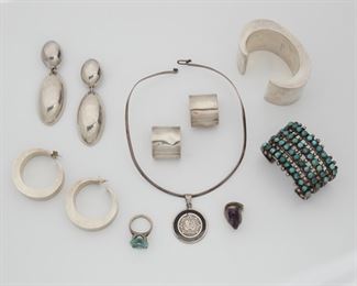 2195
A Group Of Silver Jewelry
Sterling silver
Including three pairs of earrings; two wide cuffs, a collar necklace with Aztec style pendant; and two gemstone rings
12 pieces
Estimate: $400 - $600
