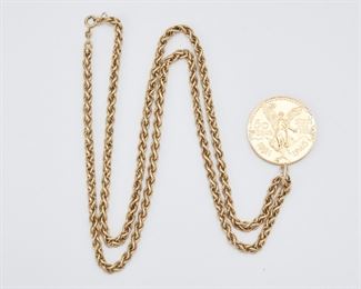 2197
A Gold Coin Necklace
Suspending a detachable 50 Pesos coin with soldered bail, with an 18k yellow gold long neckchain
32" L x 1.5" H
71 grams
2 pieces
Estimate: $2,000 - $3,000