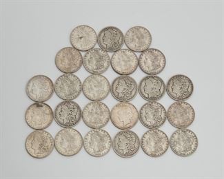2213
Twenty-Five U.S. Silver Dollars
Morgan and Peace silver dollar coins including: 1880, 1883 x 2, 1884, 1885 x 4, 1887 x2, 1889 x 2, 1891 x 4, 1892 x 2, 1896, 1902 x 2, 1921 x 3, 1926
661 grams gross
Estimate: $600 - $800