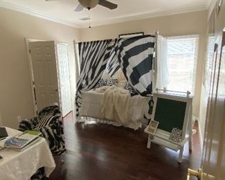 Zebra-print Canopy Bed and Bedding, Easel