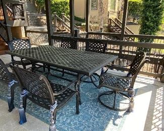 Outdoor Dining Table with Six Chairs, 2 Matching 8x10 Blue Outdoor Rugs