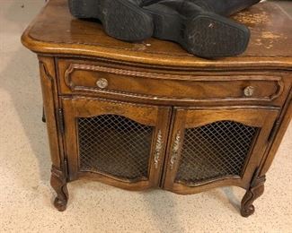 Side table and Clark leather boots. 