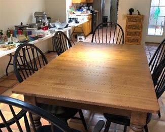 Eathan Allen table with 2  18” leaves and 6 chairs. 