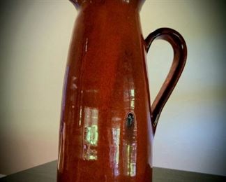 Hand-thrown pottery pitcher