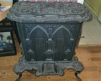 $125.00, Cast iron wood stove, has crack on back as shown in next picture