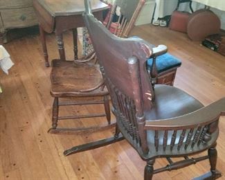 Many antique spindle rockers and chairs