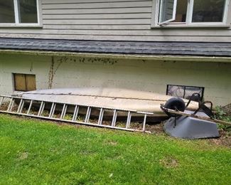 canoe, ladder and wheelbarrow