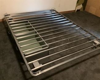Rolling metal bed frame