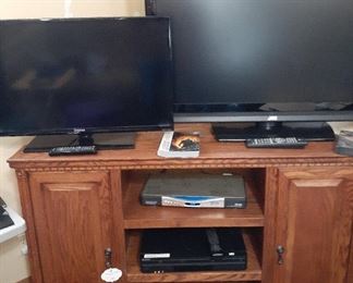 JVC 42" and Samsung 32" TVs; oak corner entertainment center