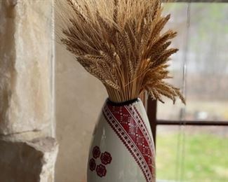 Vase with sheef of wheat arrangement