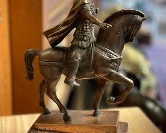 Bronze horse and rider.