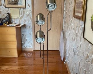 Mid-century four head chrome task lamp. Measures 63"H. 