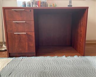 Three-drawer desk. Measures 30"W x 30"H x 19"D.