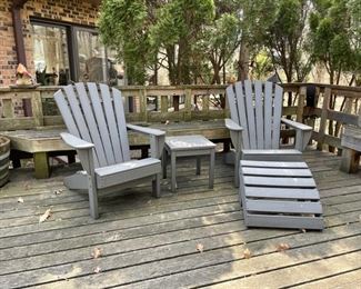 Two-all weather Adirondack chairs and ottoman. 