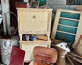 Great old cabinet with chippy paint, vintage picnic basket, two bamboo nightstands
