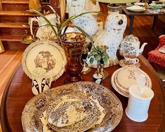 Staffordshire dogs, brown and white transferware platters