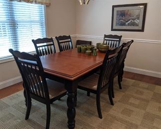 Ashley black/cherry dining table with 6  chairs 