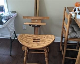 Artist's saddle stool and easel 