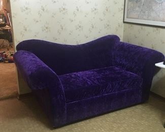 Uh... this couch might be made out of prince’s discarded suits. I mean it’s incredibly unlikely but, technically possible. Just saying.
