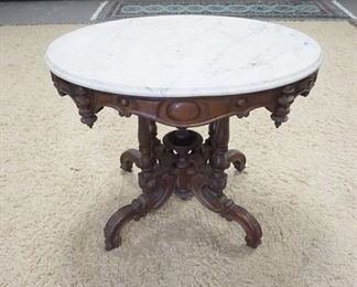 1133	VICTORIAN OVAL MARBLE TOP TABLE FOR PARLOR, 34 1/2 IN X 25 IN X 27 1/4 IN HIGH
