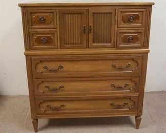 1215	7 DRAWER BATCHELOR CHEST W/CENTER COMPARTMENT, FINISH WORN ON TOP, 44 IN X 20 IN X 51 IN
