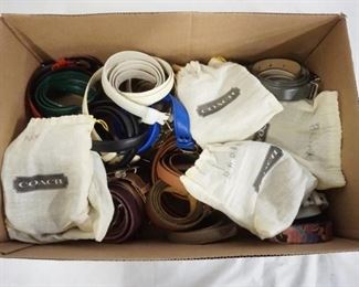 1232	LARGE LOT OF BELTS MOST OF WHICH ARE LEATHER. LOT INCLUDES 5 SIGNED COACH BELTS W/ BAGS & SIX MARKED GENUINE SNAKE/REPTILE SKIN. LOT ALSO INLCUDES DKNY, CHRISTIAN DIOR,  & LIZ CLAIBORNE. VARYING DEGREES OF WARE. AS FOUND. 
