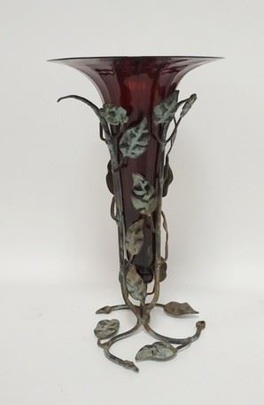 1265	RIBBED RUBY GLASS TRUMPHET VASE IN A WROUGHT IRON HOLDER, 13 IN HIGH
