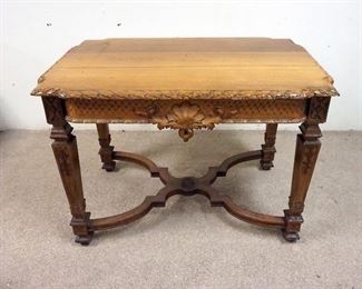 1013	WALNUT TABLE W/ CARVED SKIRTING LEGS. 41 IN X 41 IN, 29 IN H 
