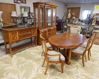 1053	NINE PIECE STANLEY CHERRY DINNING ROOM SET INCLUDING; BREAKFRONT W/ BEVELED GLASS DOORS INTERIOR LIGHTS, MARBLE INSET SERVER, SIX CHAIRS & BANDED DINNING ROOM TABLE W/2 LEAVES
