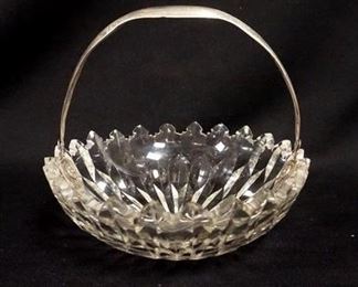 1087	CUT PANELED BOWL W/COIN SILVER HANDLE, SOME ROUGHNESS IN TOP, 7 IN WIDE
