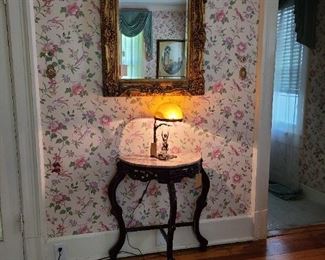 18.) Indonesian demi lune marble top table. 29"w x 16"d x 31"h. 