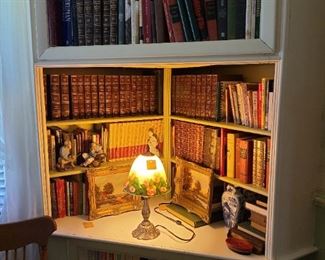 40.) Reverse painted dome shade on cast metal base. (reproduction).