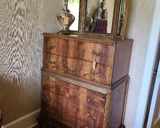 37.) Chest on chest one part form mahogany veneers and applied trim and moldings, 37"w x 20"d x 52.5"h. Circa 1920