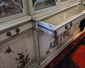 58.) Detail of desk top leather surface. 