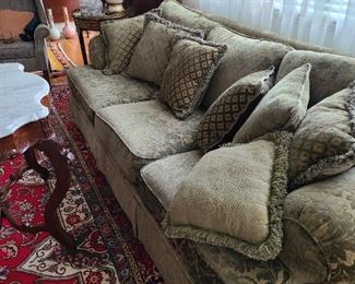 54.) Modern over stuffed sofa. There are a couple of matching pieces throughout the residence.  