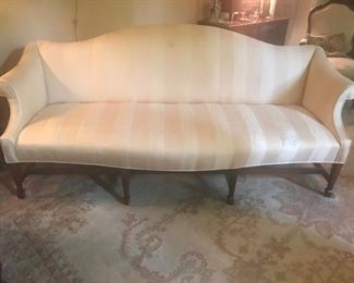 $150-Has some wear and tear, but could be reupholstered.  