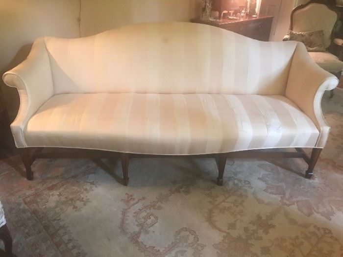 $150-Has some wear and tear, but could be reupholstered.  
