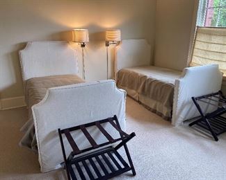 A pair of twin beds with upholstered bed frames for sale. Headboards are 42 inches wide by 51 inches high. Footboard is 42 inches wide by 36 inches high. $360 for the pair. Beds are 76" long. We will consider splitting so ask!