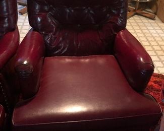 One of a Pair of Worn Red Leather Chairs