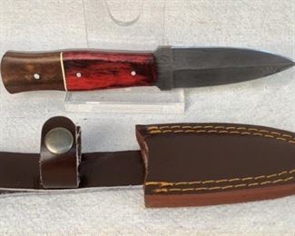 Mfg - Custom Hand Made
Model - Damascus Steel Knife
Caliber - 4" Blade
Located in Chattanooga, TN
This lot contains a Custom hand made Damascus steel fixed blade full tang knife. 4" Blade, overall length 8.5". Comes with a custom leather sheath.